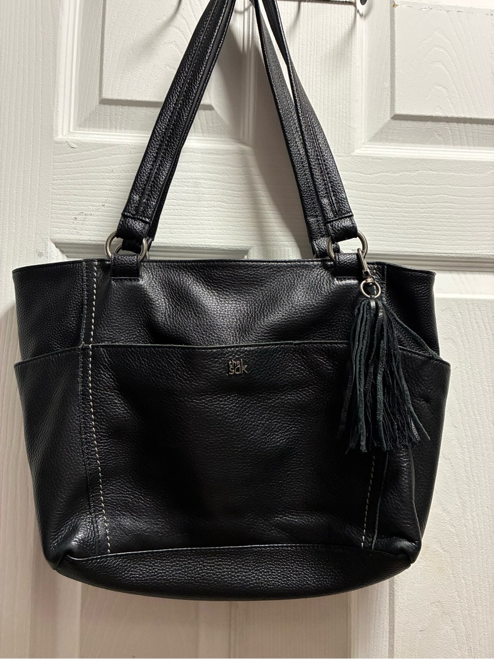 The Sak Black Pebbled Hobo Tote with Tassel Charm